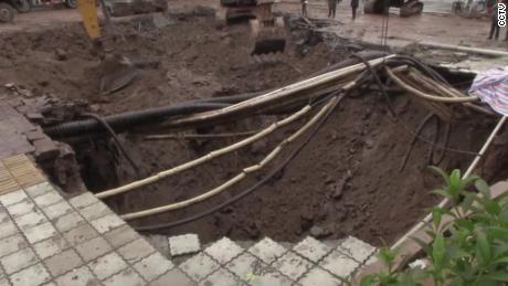 Four people were swallowed by the sinkhole when it opened up.