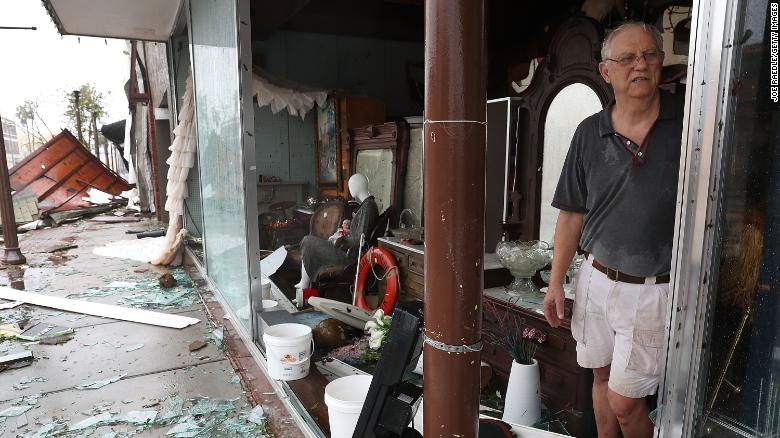 PANAMA CITY, FL - OCTOBER 10:  Mike Lindsey stands in his antique shop  after the winds from hurricane Michael broke the windows in his shop on October 10, 2018 in Panama City, Florida. The hurricane hit the Florida Panhandle as a category 4 storm.  (Photo by Joe Raedle/Getty Images)