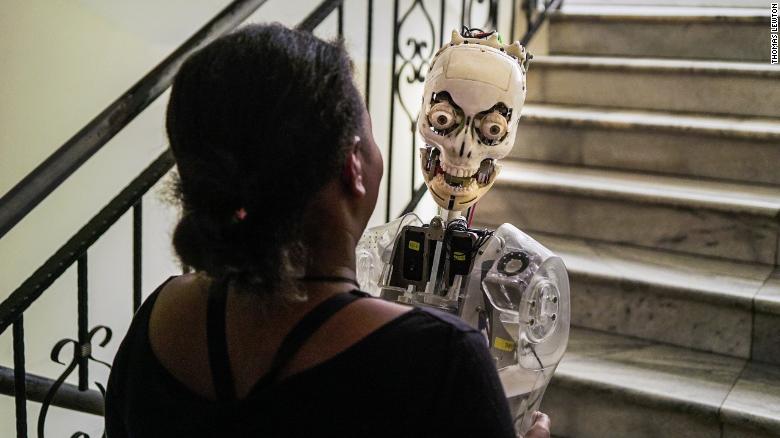 Betelhem Dessie carries a prototype of Sophia the robot at iCog Labs. Image: Thomas Lewton. 