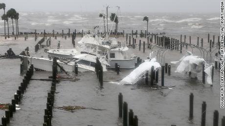 The hurricane damages boats at the Port St. Joe Marina on Wednesday.