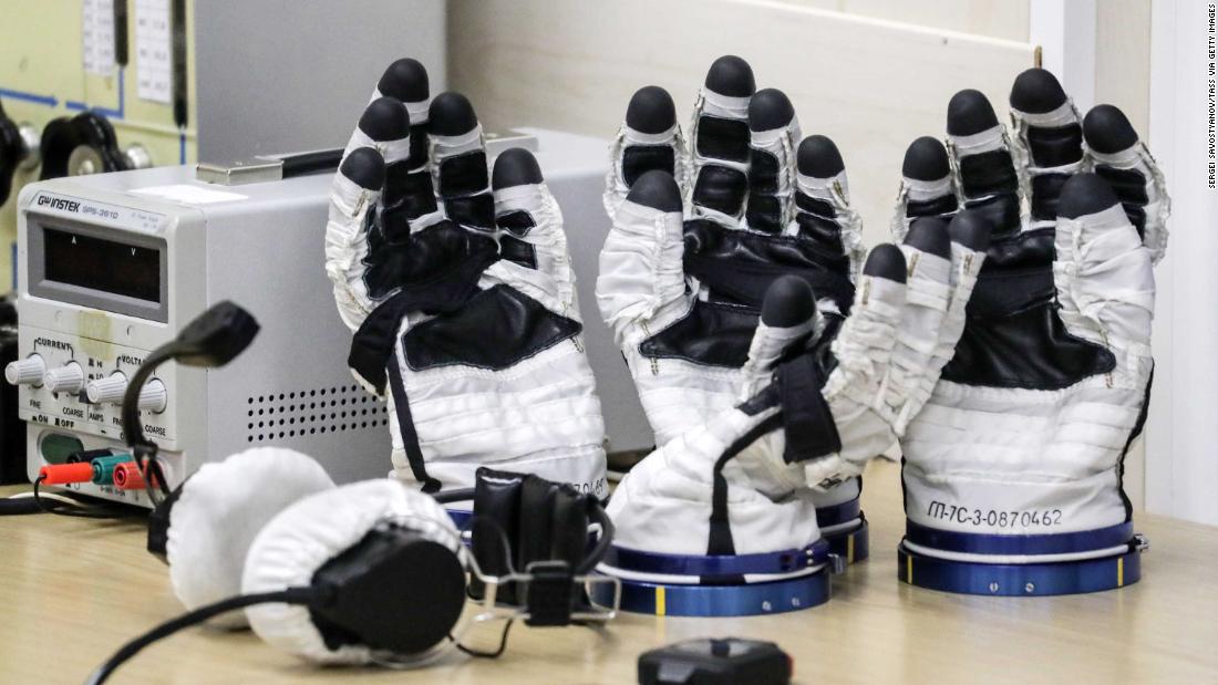 Gloves from the astronauts&#39; space suits are checked ahead of the scheduled launch on October 11.