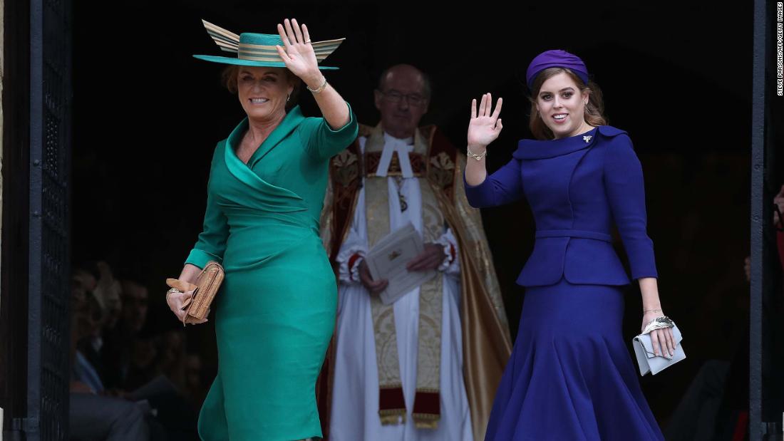 The bride&#39;s mother, Sarah, Duchess of York, and Princess Beatrice of York wave from outside St. George&#39;s Chapel.