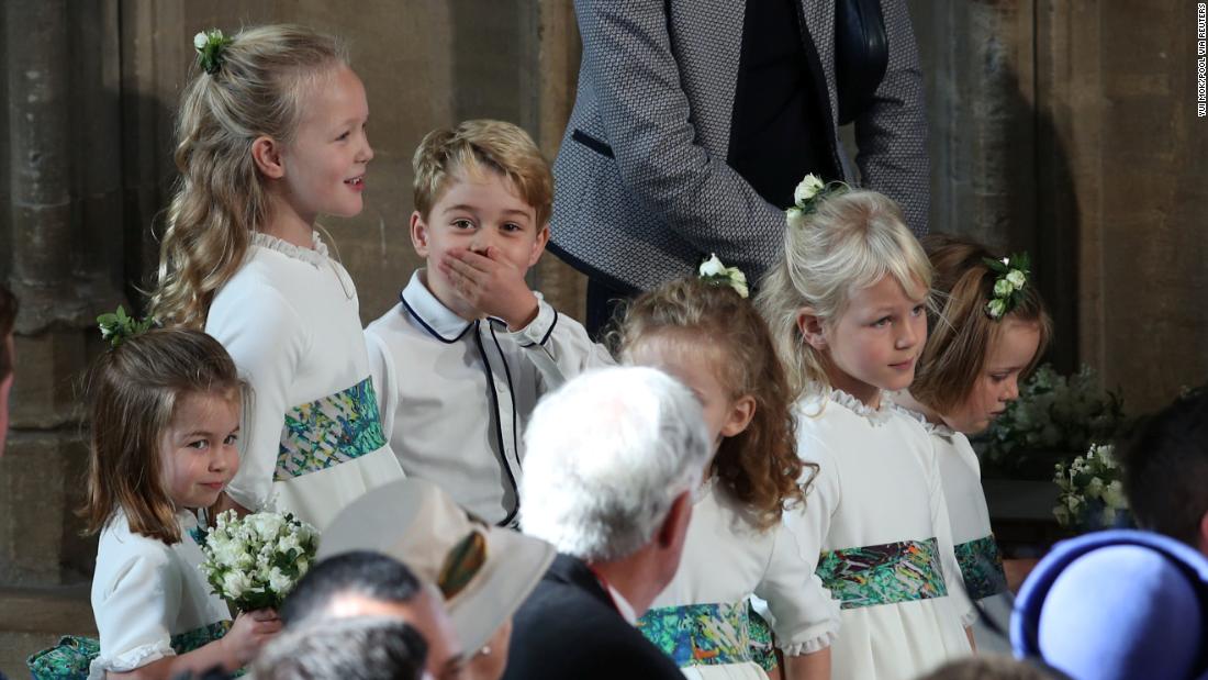 The bridesmaids and page boys, including Prince George and Princess Charlotte, arrive for the wedding.