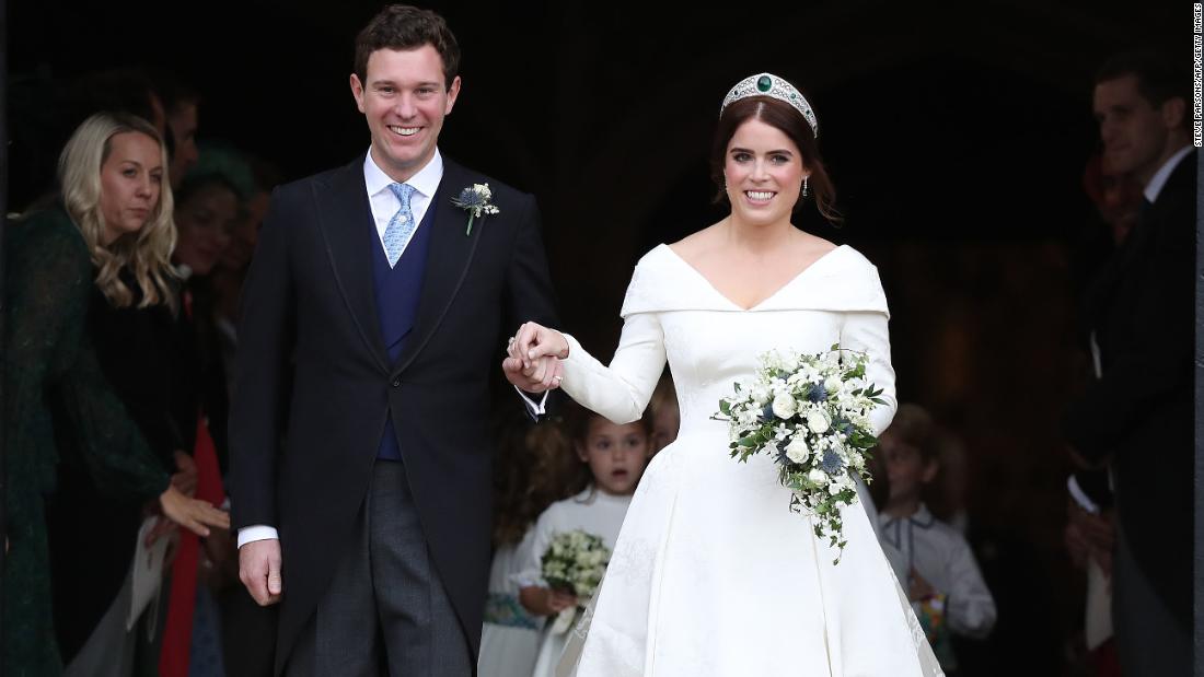 Britain&#39;s Princess Eugenie of York and her husband Jack Brooksbank emerge from St. George&#39;s Chapel, Windsor Castle on Friday, October 12 after their wedding ceremony.