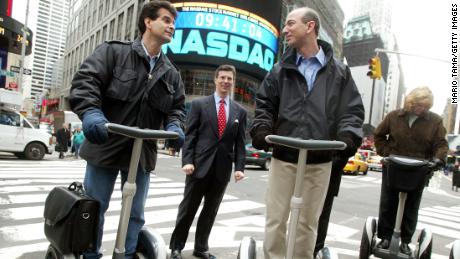 Segway inventor Dean Kamen rides a Segway with Jeff Bezos in New York City in 2002.