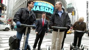 Segway inventor Dean Kamen rides a Segway with Jeff Bezos in New York City in 2002.