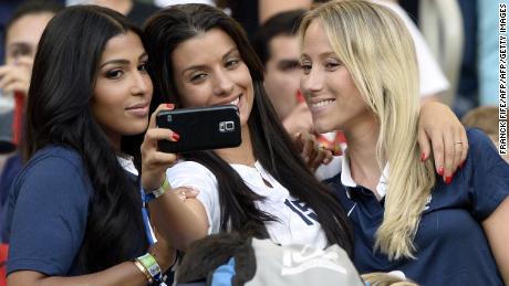 Sakho's wife Magda (L) is pictured at the World Cup in Brazil in 2014.