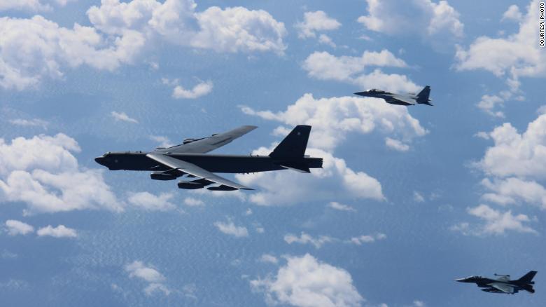 An Air Force B-52H Stratofortress bomber and a Japan Air Self-Defense Force F-15 and F-2 fighter execute a routine bilateral training mission over the East China Sea and the Sea of Japan, Sept. 26, 2018. 