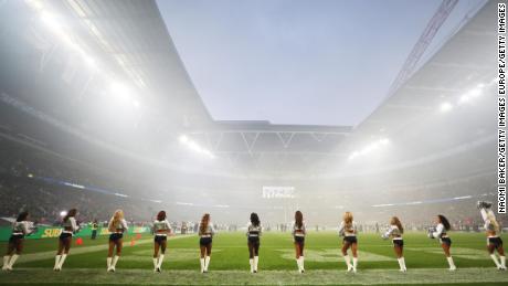 The Oakland Raiders cheerleaders -- "The Raiderettes" -- look on ahead of the game against the Seattle Seahawks.