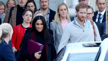 Prince Harry and wife Meghan pictured arriving into Sydney on Monday. 