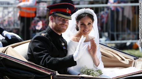 The newlyweds during their post-wedding carriage procession in Windsor, England in May 2018.  