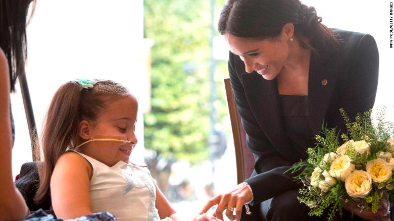 The duchess talks to seven-year-old Matilda Booth at the WellChild awards on September 4.