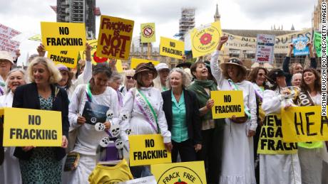 Women from the Lancashire anti-fracking movement dressed as suffragettes to protest fracking in the UK.