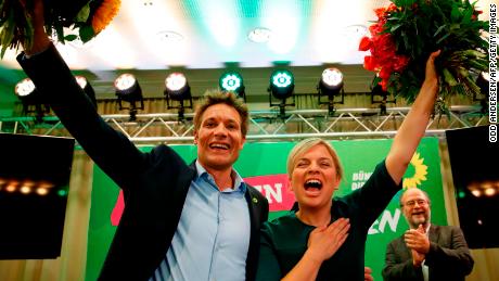 Katharina Schulze and Ludwig Hartmann, co-leaders of the Green Party in Bavaria, celebrate the results Sunday evening. 