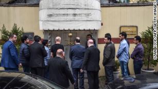 A Saudi investigation delegation enters the Saudi Arabian consulate Monday before Turkish investigators arrive.