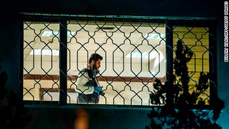 A Turkish forensic police officer works in Saudi Arabia's consulate in Istanbul on October 15, 2018 during the investigation over missing Saudi journalist Jamal Khashoggi. 