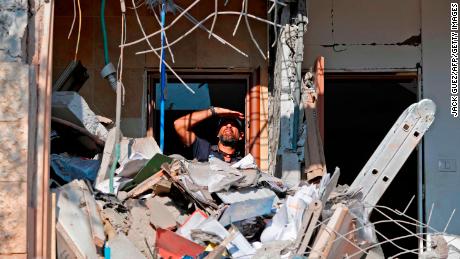 An Israeli sapper checks a house in the Israeli city of Beer Sheva after it was hit by a rocket fired from Gaza.