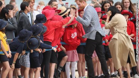 Prince Harry and Meghan, Duchess of Sussex, meet the public on a visit to a Melbourne beach.