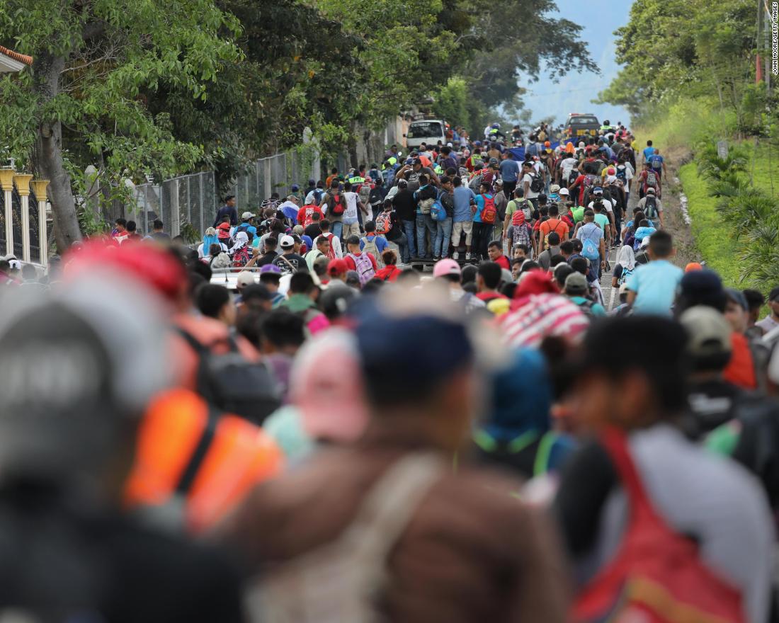 The caravan moves north after crossing the border from Honduras into Guatemala on Monday.