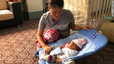 Pan Ei Mon, wife of Wa Lone, with their daughter Thet Htar Angel, who was born on August 10.