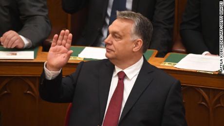 Hungarian Prime Minister Viktor Orban waves prior to a swearing-in ceremony for members of the new Hungarian parliament on May 8, 2018 during the constituent assembly of the Hungarian Parliament in Budapest. 