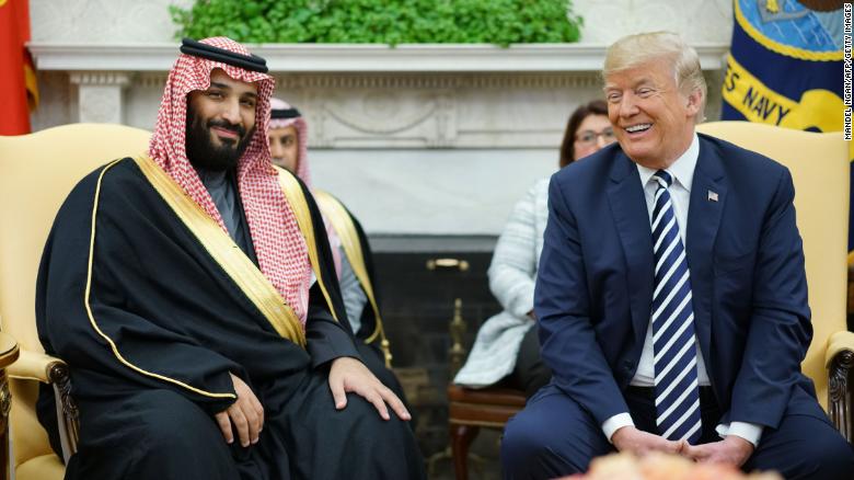 US President Donald Trump (R) meets with Saudi Arabia's Crown Prince Mohammed bin Salman in the Oval Office of the White House on March 20, 2018 in Washington, DC. 