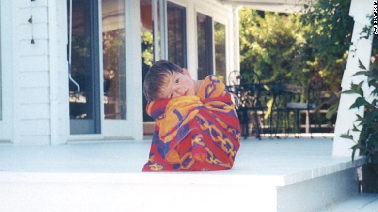 John Sarcona as a young boy, before his severe scoliosis developed.