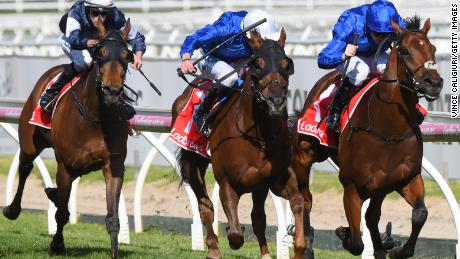 Benbatl (right) edged out Blair House to win the Caulfield Stakes for trainer Saeed bin Suroor.