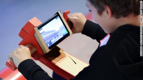 A child tests out the Nintendo Labo kit