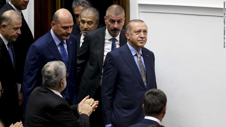 Erdogan is applauded inside the Turkish parliament in Ankara.