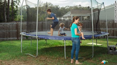 Anna Lanternari, wife of Nanobébé cofounder Ayal Lanternari, watches their children play at a friend's house in Charleston.