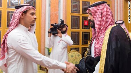 Saudi Crown Prince Mohammed bin Salman and his father King Salman pictured shaking hands with Salah bin Jamal Khashoggi, the journalist's eldest son, and Sahl bin Ahmad Khashoggi, another relative, at Al Yamama Palace in Riyadh in October, after Jamal Khashoggi's killing.