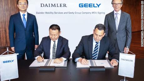 Geely and Daimler executives signed an initial agreement on a new ride-hailing joint venture on Wednesday at Daimler's headquarters in Stuttgart, Germany. 