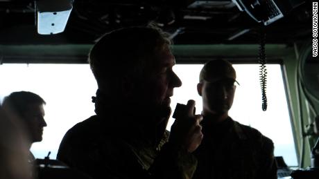 Admiral James G. Foggo III addresses service personnel on the USS Iwo Jima ambibious assault ship ahead of training exercises in Iceland.