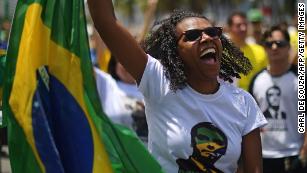 A supporter of Jair Bolsonaro takes part in a rally Sunday in Rio de Janeiro.