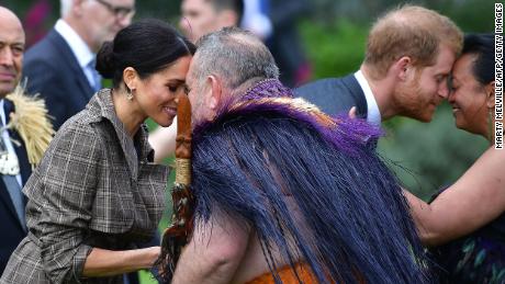 Meghan and Harry receive a "hongi" during welcoming ceremony at Government House in Wellington.