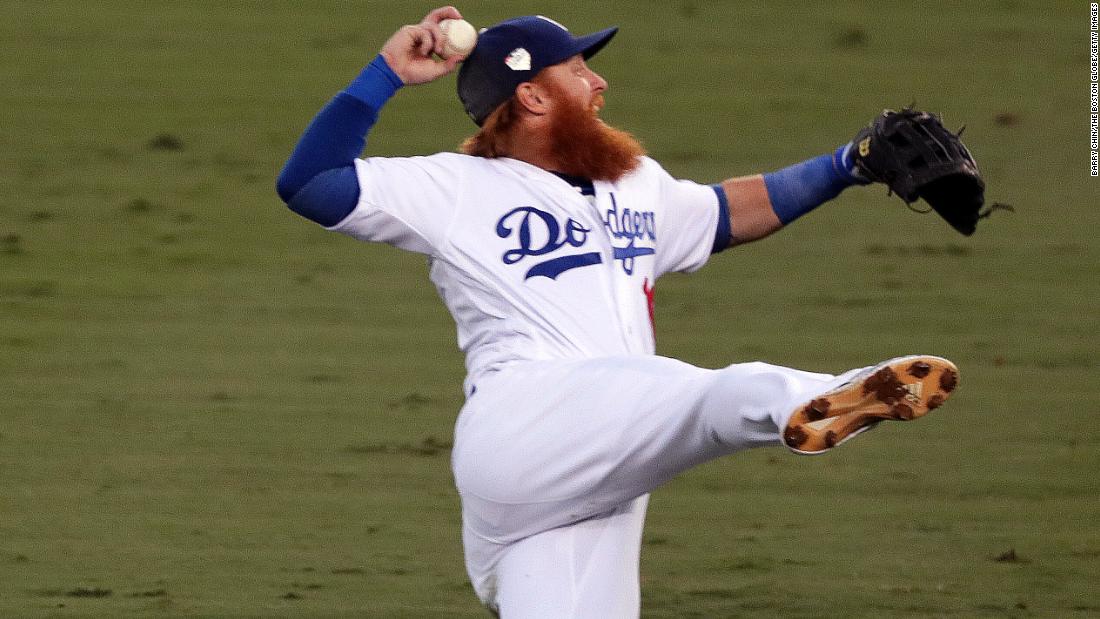 Dodgers third baseman Justin Turner fields a single by Red Sox center fielder Jackie Bradley Jr. during the third inning of Game 3 at Dodger Stadium.