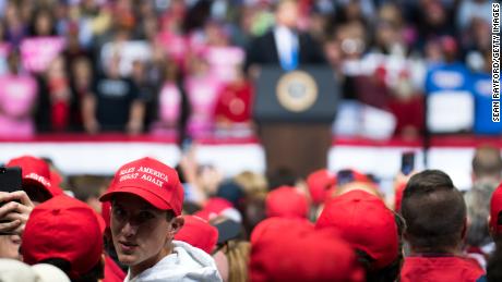 Supporters of President Donald Trump listen as the president addresses the crowd during a campaign rally at the Bojangles Coliseum on October 26, 2018 in Charlotte, North Carolina. (Photo by Sean Rayford/Getty Images)