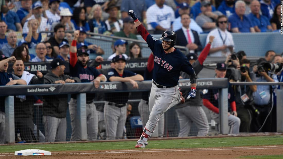 Steve Pearce of the Red Sox celebrates his first-inning two-run home run against the Dodgers in Game 5.