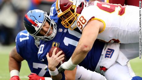 Eli Manning is sacked by Washington's Matthew Ioannidis. The Giants dropped to 1-7 with their latest loss.