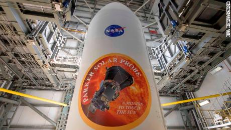 The United Launch Alliance Delta IV Heavy rocket payload fairing is seen with the NASA and Parker Solar Probe emblems. 