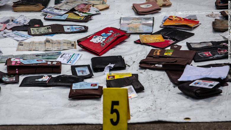Personal items from Lion Air flight 610 seen as Search and Rescue personnel examine recovered material at the Tanjung Priok port on October 30, 2018 in Jakarta, Indonesia.