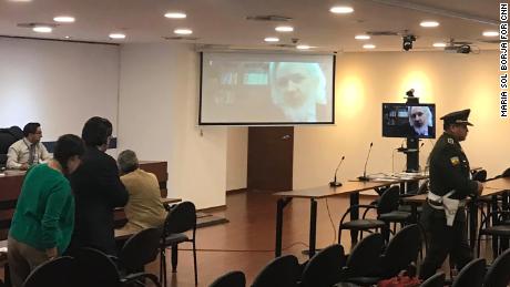 Assange is seen for the first time in months after appearing via teleconference at a hearing in Quito, Ecuador, on Thursday, October 25, 2018. The hearing was then postponed due to translation difficulties.