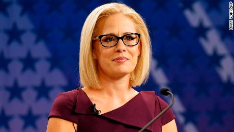 U.S. Rep. Kyrsten Sinema, D-Ariz., goes over the rules in a television studio prior to a televised debate with U.S. Rep. Martha McSally, R-Ariz., Monday, Oct. 15, 2018, in Phoenix. Both ladies are seeking to fill the seat of U.S. Sen. Jake Flake, R-Ariz. who is retiring. The Arizona Senate contest is one of the most closely-watched in the nation. 