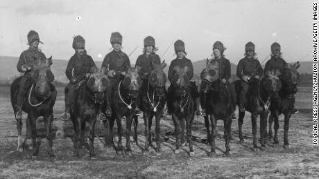 December 1915: Canadian cavalrymen with drawn swords