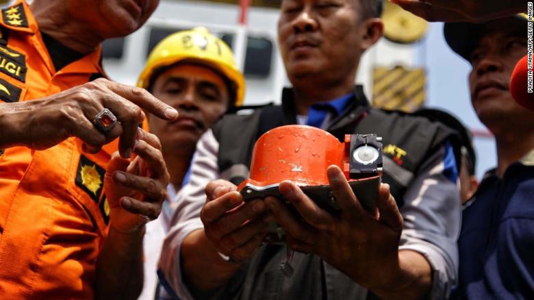 A photo from Indonesian media agency &quot;detikcom&quot; shows officials displaying part of the ill-fated Lion Air flight JT 610&#39;s flight data recorder, after it was recovered from the Java Sea on Thursday, November 1.