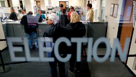 Residents line up for early voting in Des Moines, Iowa. 