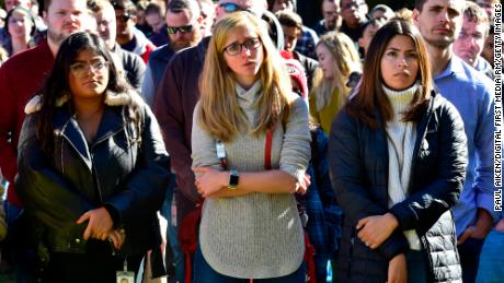  Google employees Sam Moreno, left, Katie Slavin, and Keny Cueltar listen to speakers during the Boulder Colorado Google Campus &quot;Walkout For Real Change.&quot;