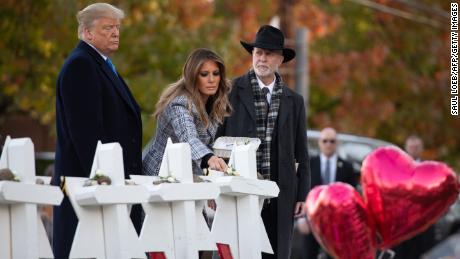 The Trumps, with Rabbi Jeffrey Myers, pay their respects in Pittsburgh.