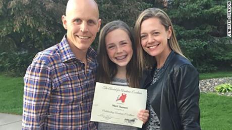 Marit Swenson with her parents, Jennifer and Peter Swenson, about a year before her diagnosis.